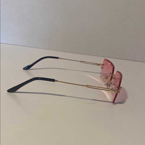 Pink and Gold Rimless Sunglasses with Retro Charm - Picture 2 of 3